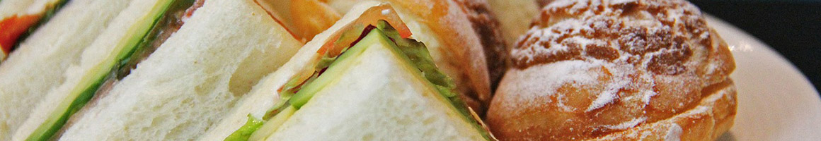 Eating Sandwich Bakery at Le Quartier Bakery & Café - Meridian Park restaurant in Lincoln, NE.